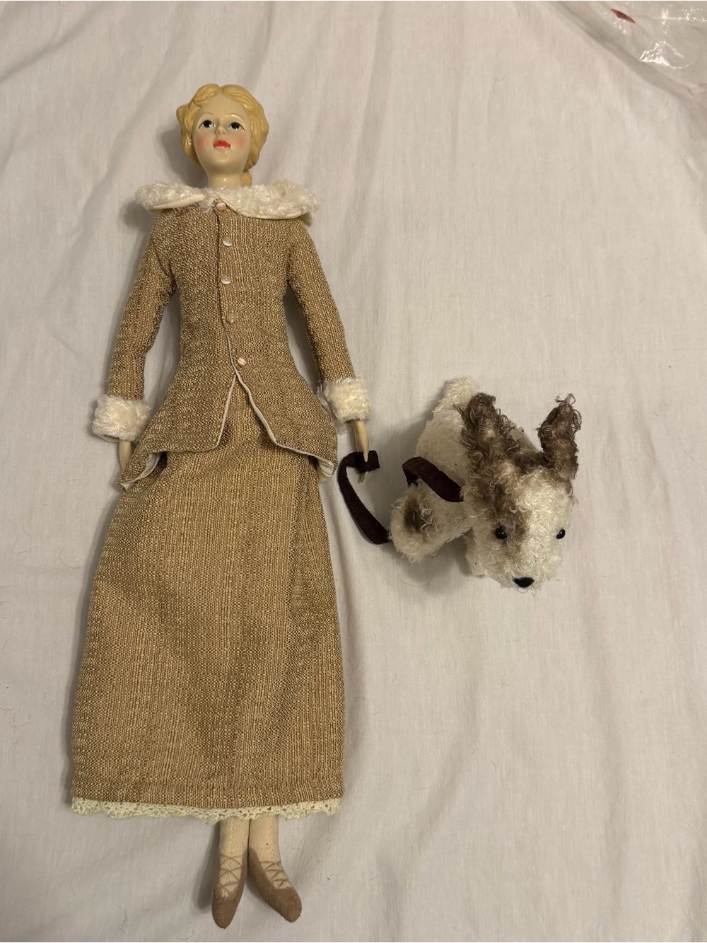 Blonde Porcelain Doll with Tan Outfit and Plush Dog